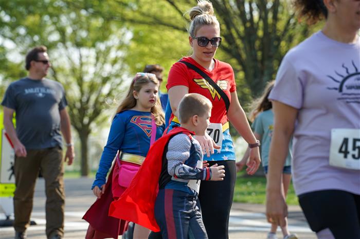 Runners and walkers for the Sunrise Superhero 5K 2024