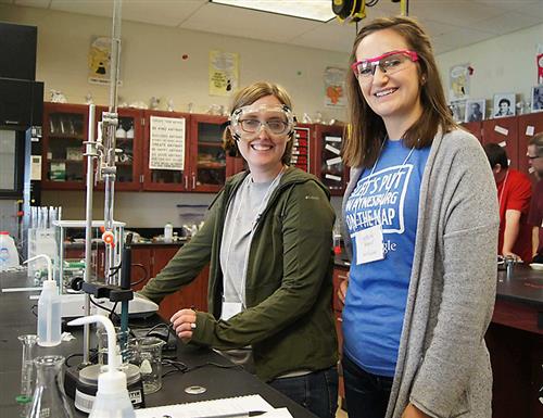Two female AP Chemistry students in the lab 