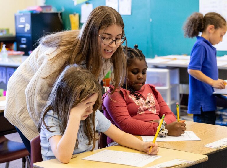 Teacher with students