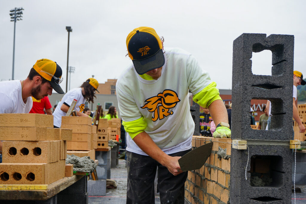 students participate in bricklayer competition and explore career pathways