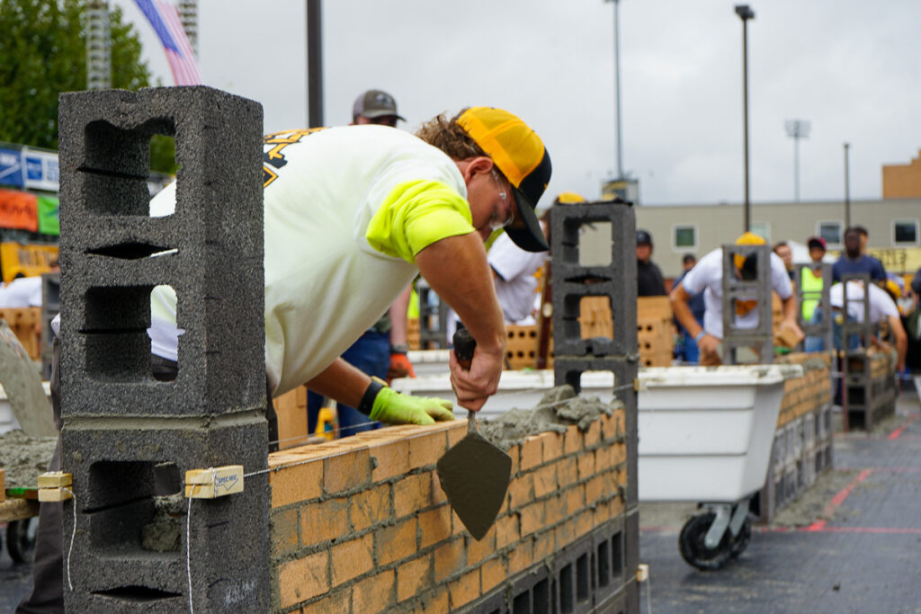 students participate in bricklayer competition and explore career pathways