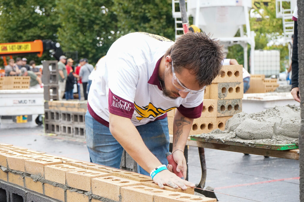 students participate in bricklayer competition and explore career pathways