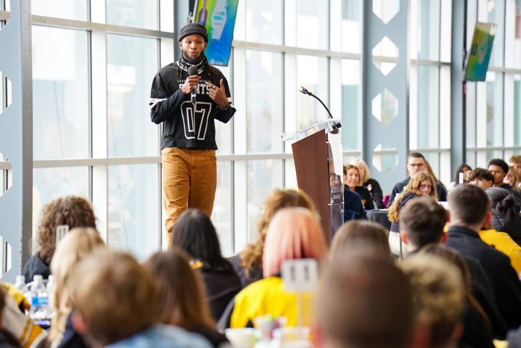 Tre Tipton giving keynote speech