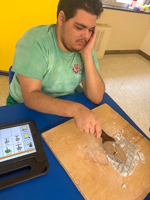 students building gingerbread house