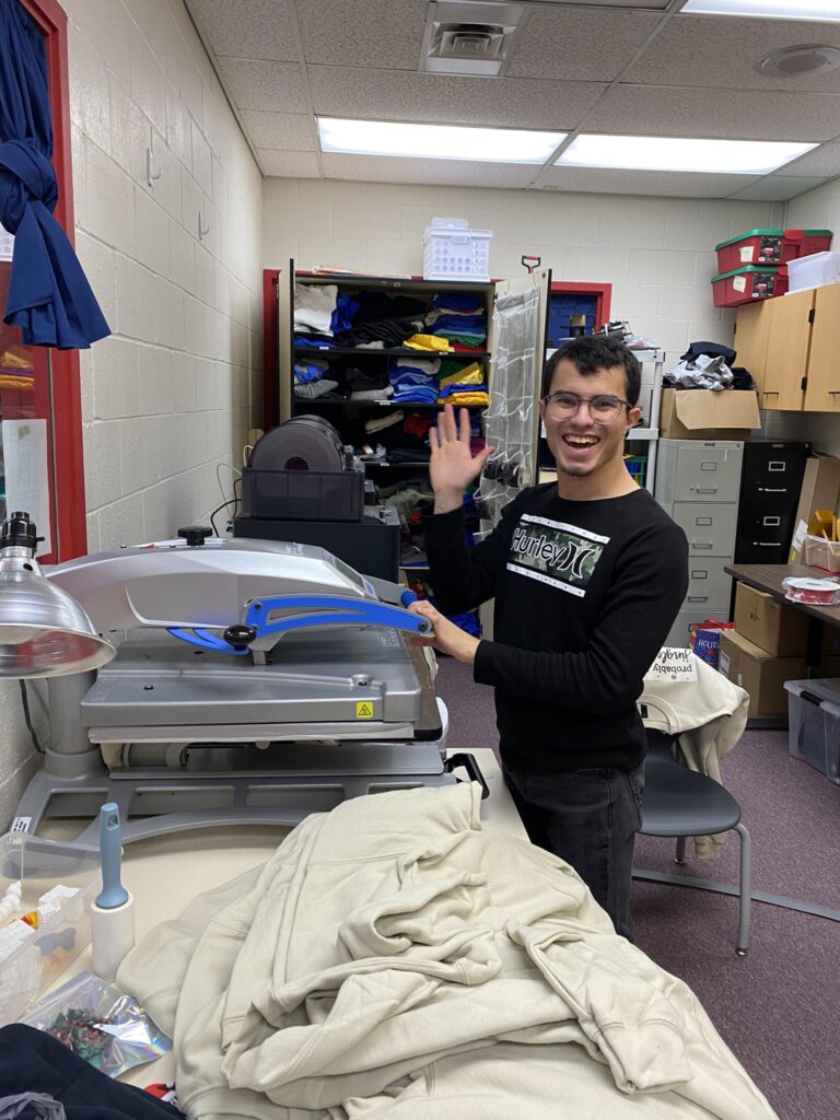 students learn to use heat press