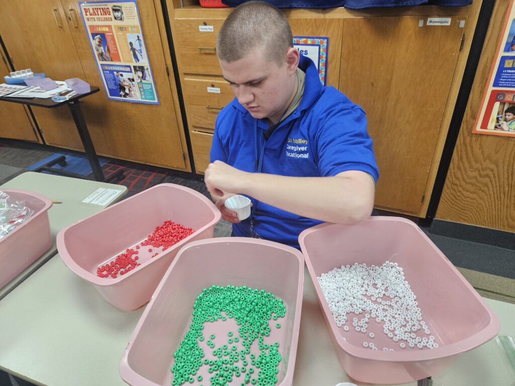 students participate in elf workshop activity
