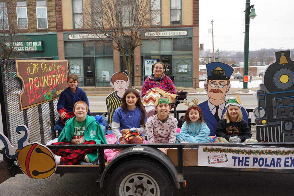 Photo of seven children sitting in the trailer