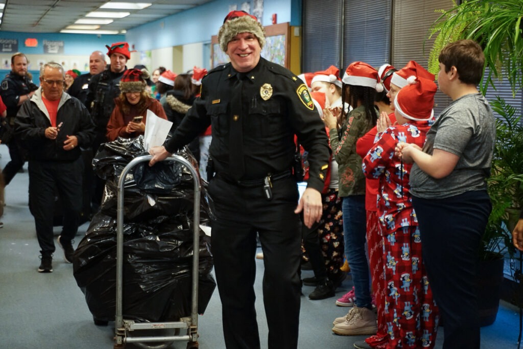 police officers arrive with presents