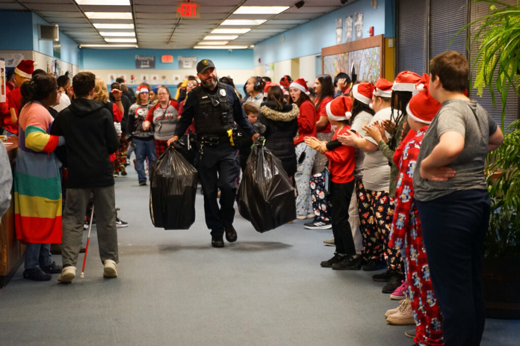 police officers arrive with presents