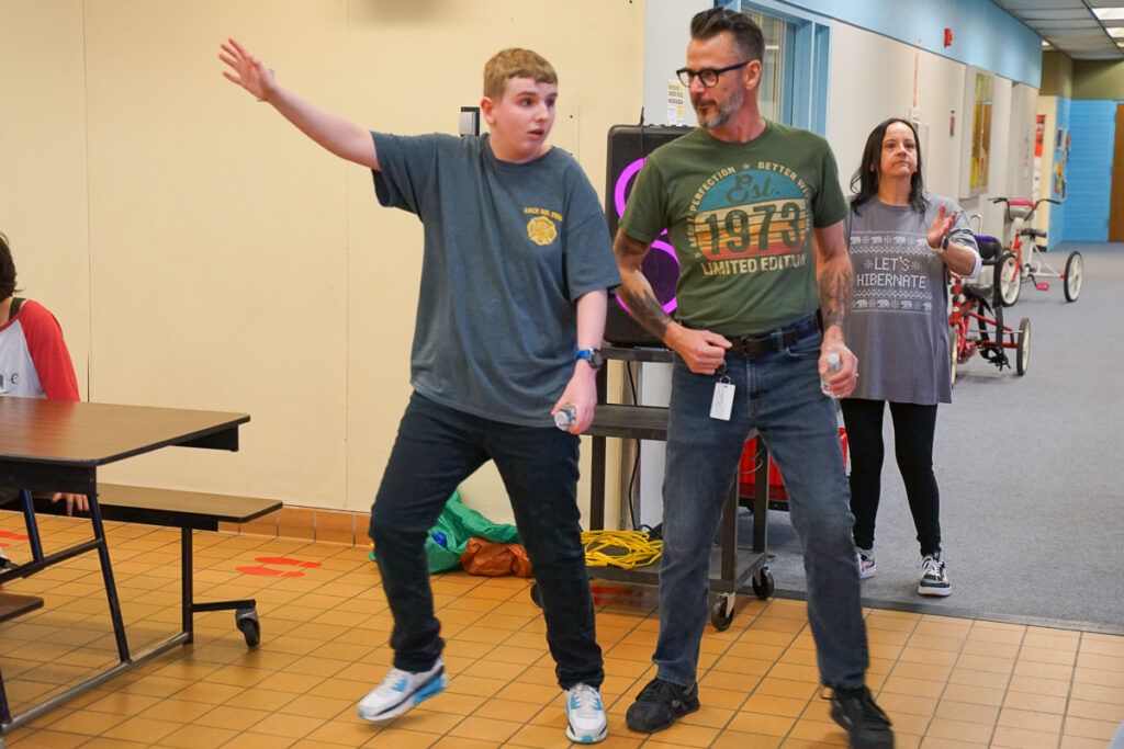 student sings christmas karaoke