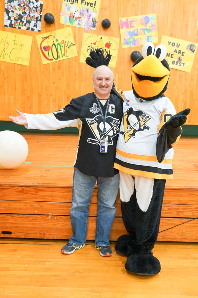 pittsburgh penguins mascot with principal David Campos