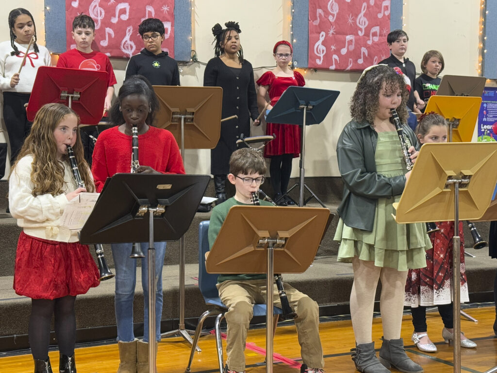 students perform band concert