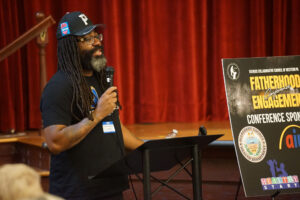 Mayor of Wilkinsburg Dontae Comans addresses attendess
