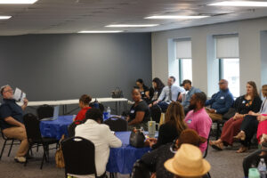 attendees converse during breakout sessions