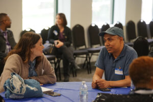 attendees converse during breakout sessions