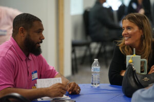 attendees converse during breakout sessions