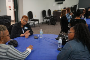 attendees converse during breakout sessions