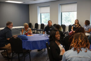 attendees converse during breakout sessions