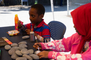 Children painting rocks