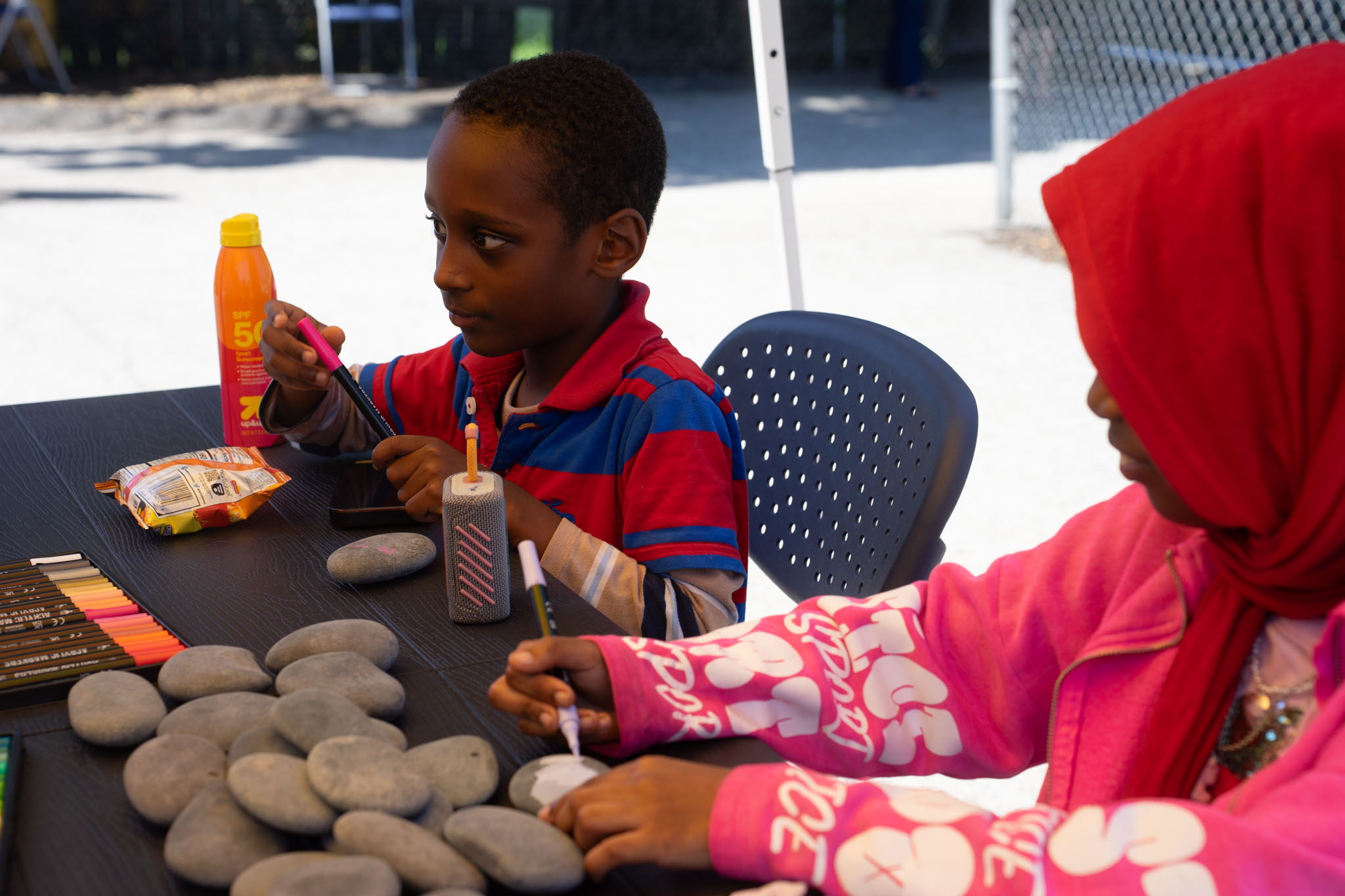 Children painting rocks