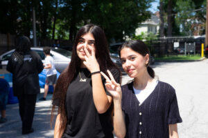 two girls posing for the camera