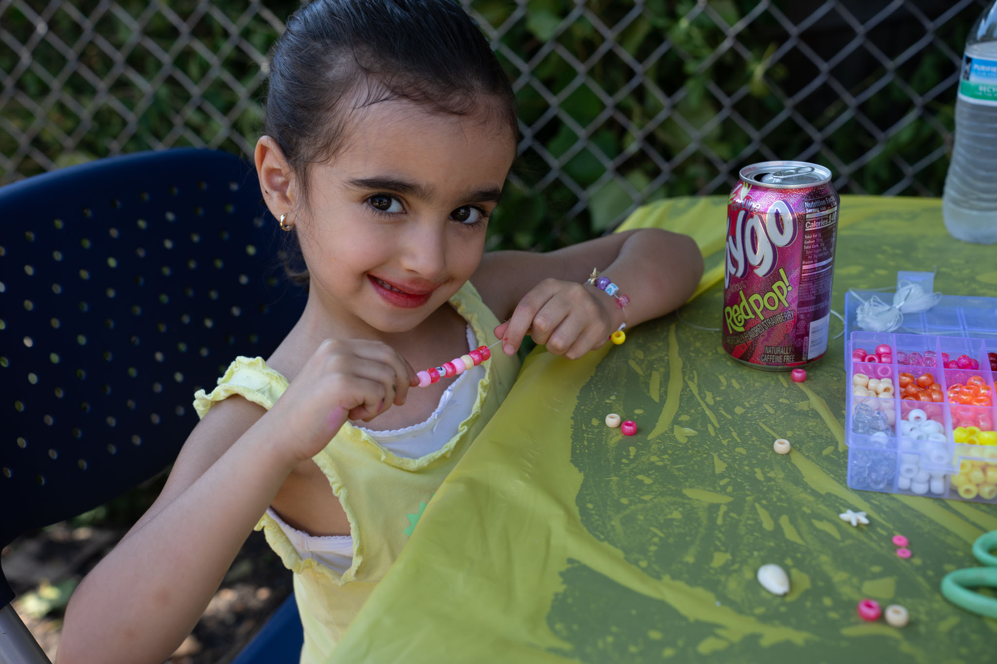 girl sharing her bracelet design