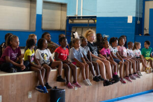Summer camp kids singing a group song