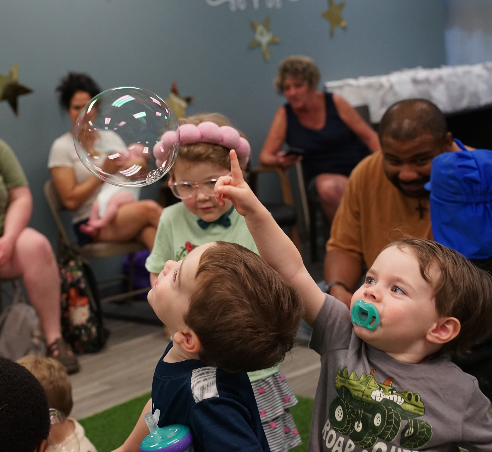 Children playing with bubbles