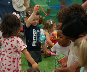Children playing with bubbles