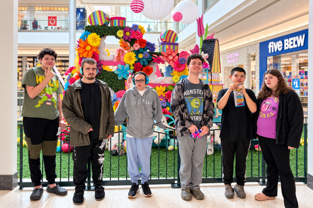 mon-valley-transition1 students pose inside the mall