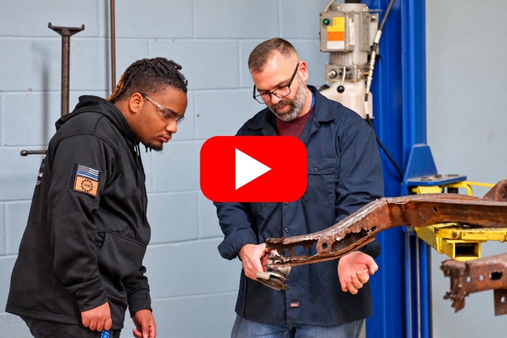 student and teacher in auto shop