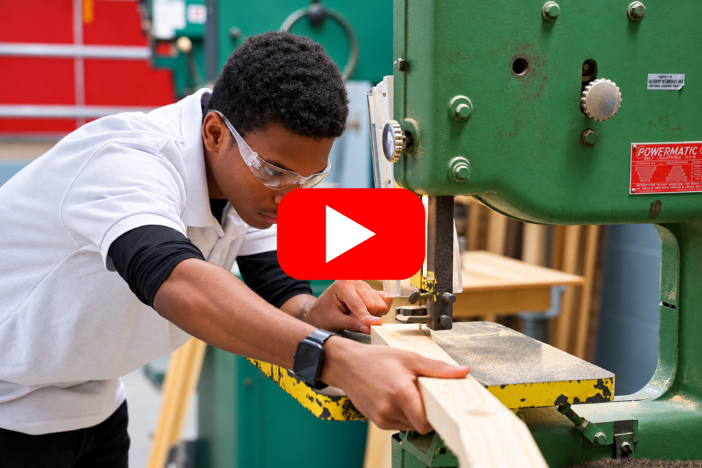 student uses industrial equipment