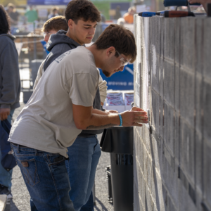 Students participate in the Bricklayer 500 event.