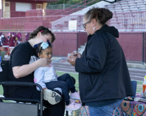 Another vendor does face painting for the kids