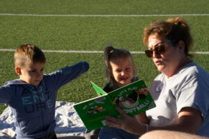Ms. Robin reading to kids