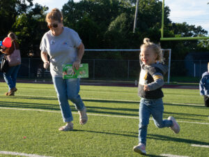 Ms. Robin playing along with kids