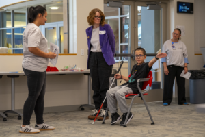 student who is blind or visually impaired participates in cane quest