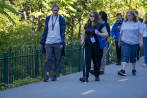student who is blind or visually impaired participates in cane quest
