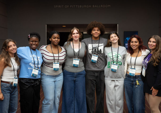 group photo of student panelists in front of the ballroom entrance