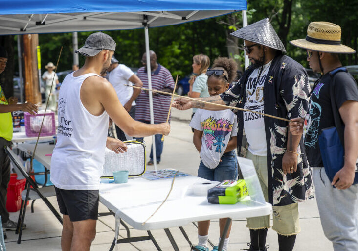 Fishburgh staff getting families equipped with fishing gear